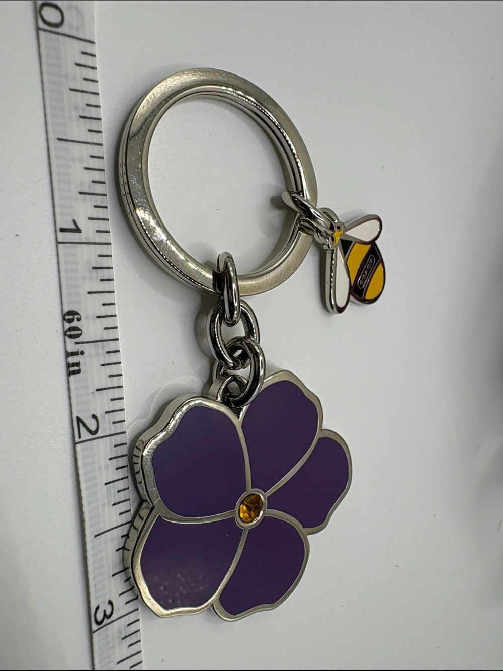 Coach Purple Enamel Flower Keychain with Yellow Bee Accent
